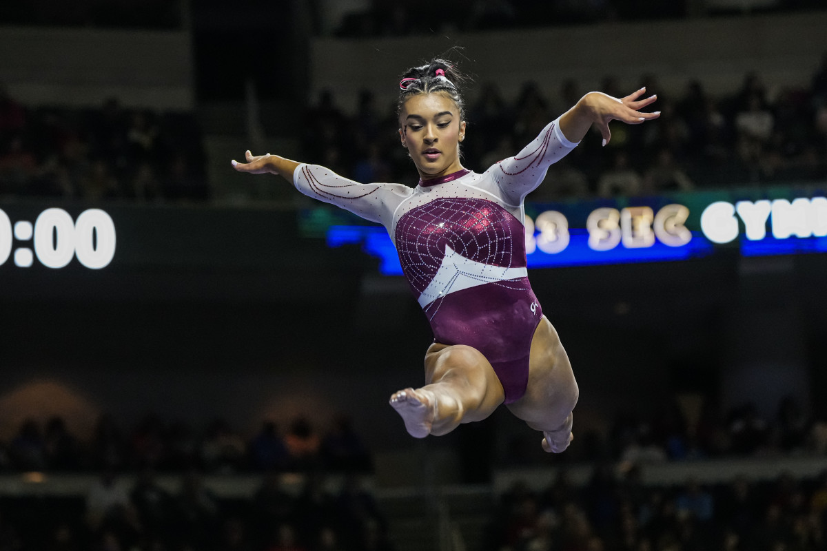 Alabama Crimson Tide gymnast Luisa Blanco competes on the balance beam during the SEC Gymnastics Championship at Gas South Arena.